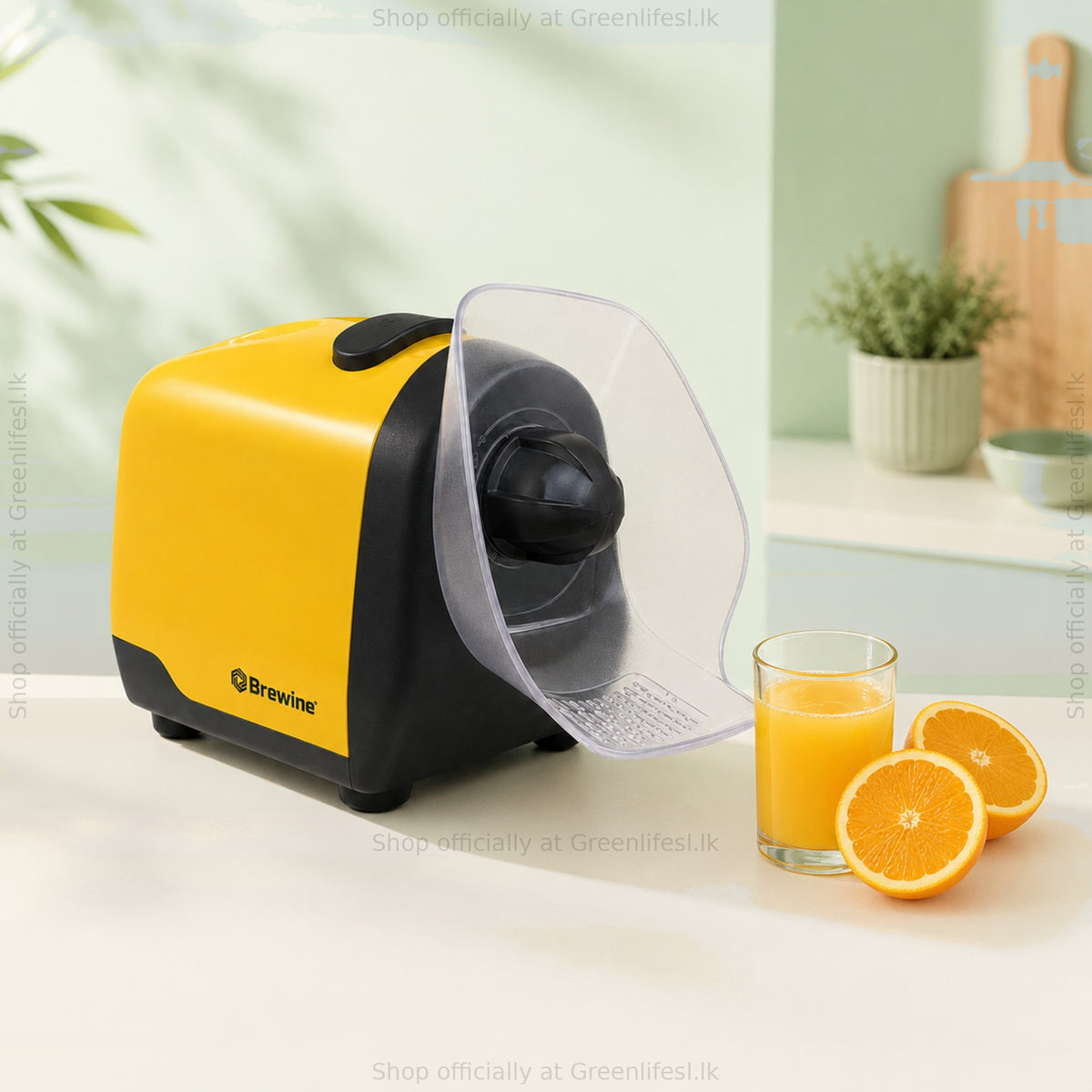 Brewine 2-in-1 coconut scraper and citrus press with citrus cone fitted, beside fresh orange juice