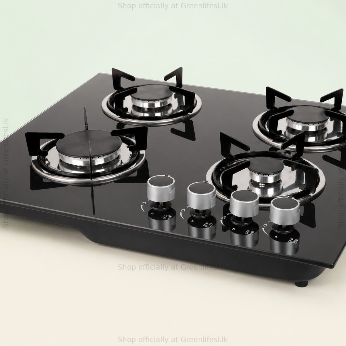 Green Life 4-burner tempered glass gas hob close-up of burners, pan supports and knobs