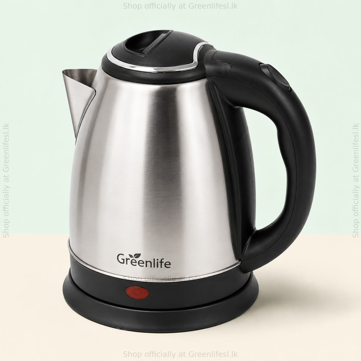 Green Life 1.8L stainless steel electric kettle with black handle and base, three-quarter view