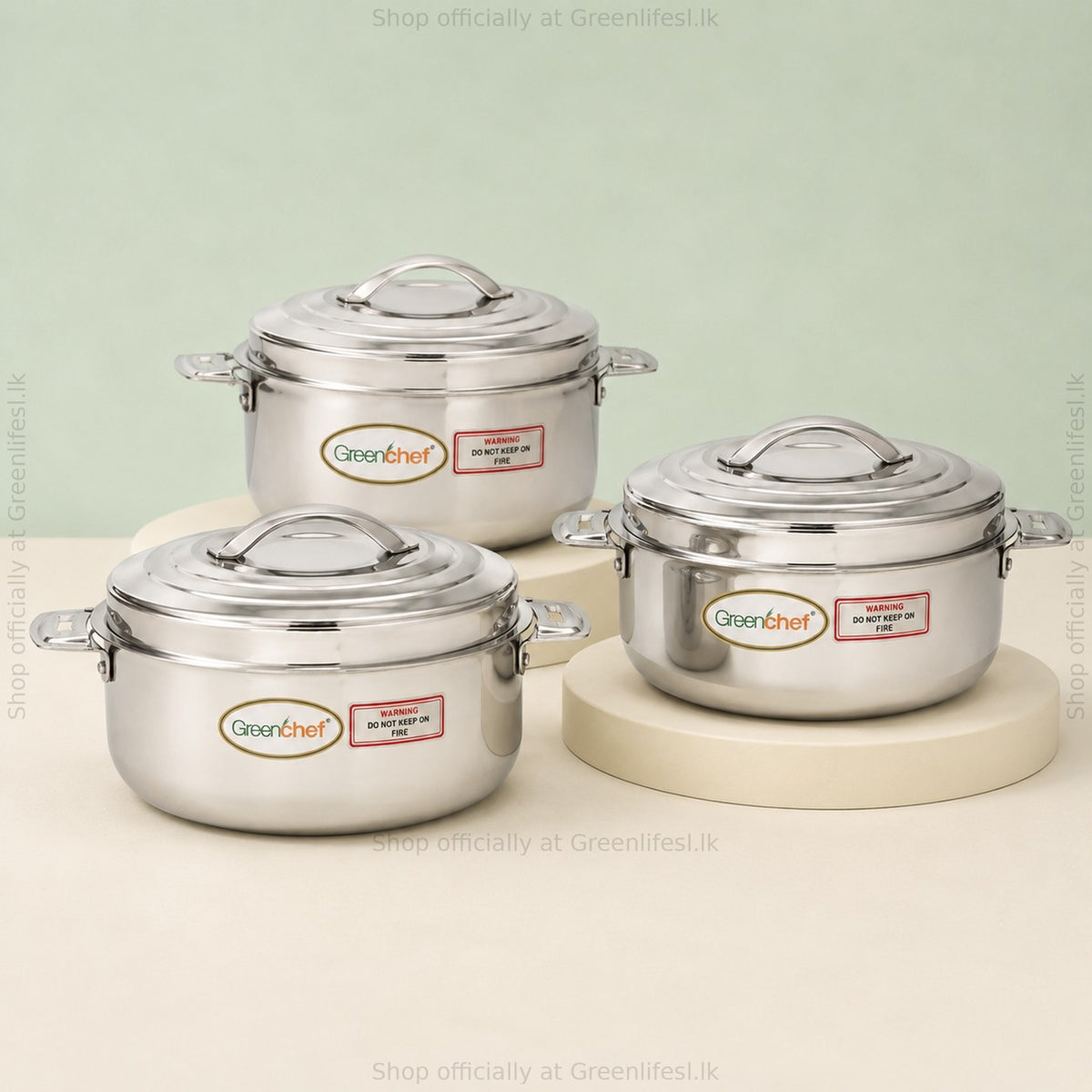 GreenChef Platina stainless steel casserole set of three arranged on stepped plinths