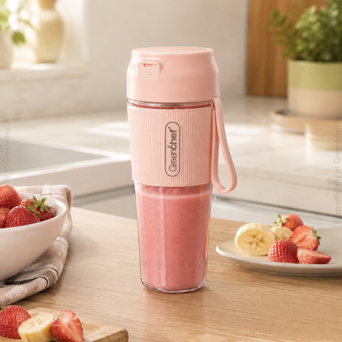GreenChef Pulse wireless portable blender 300ml with a strawberry smoothie on a kitchen counter