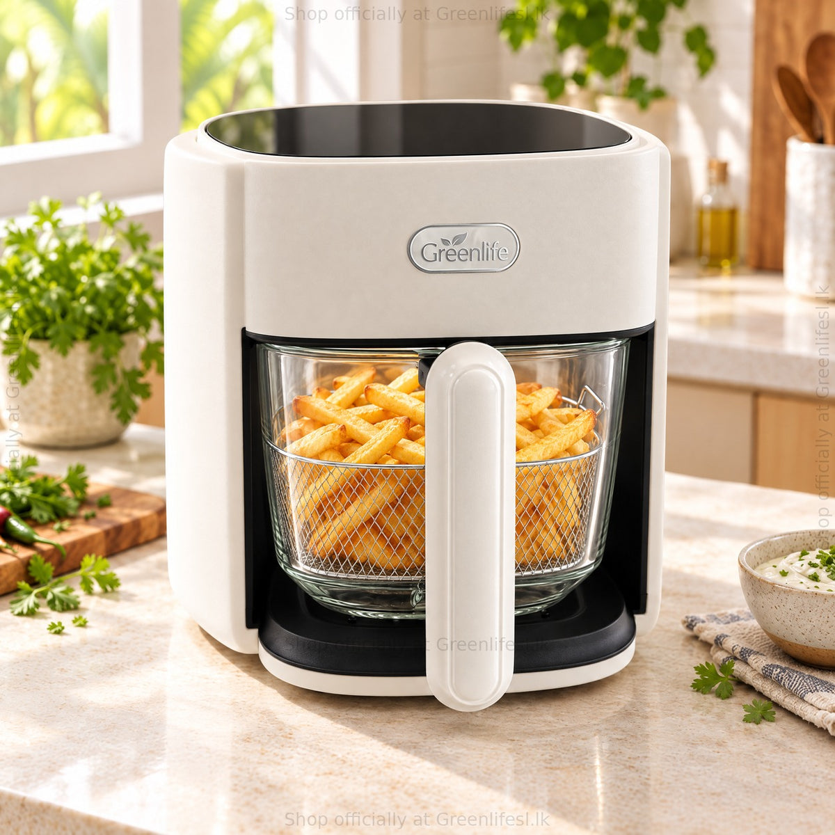 Greenlife 4.5L glass air fryer with golden fries in the square glass bowl on a kitchen counter