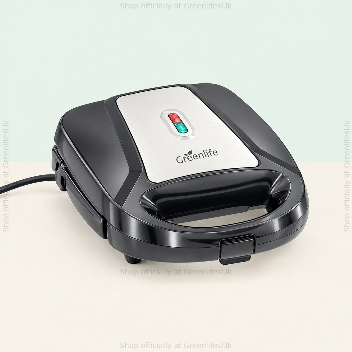 Greenlife 7-in-1 sandwich, waffle and donut maker seen from the side with its power cord