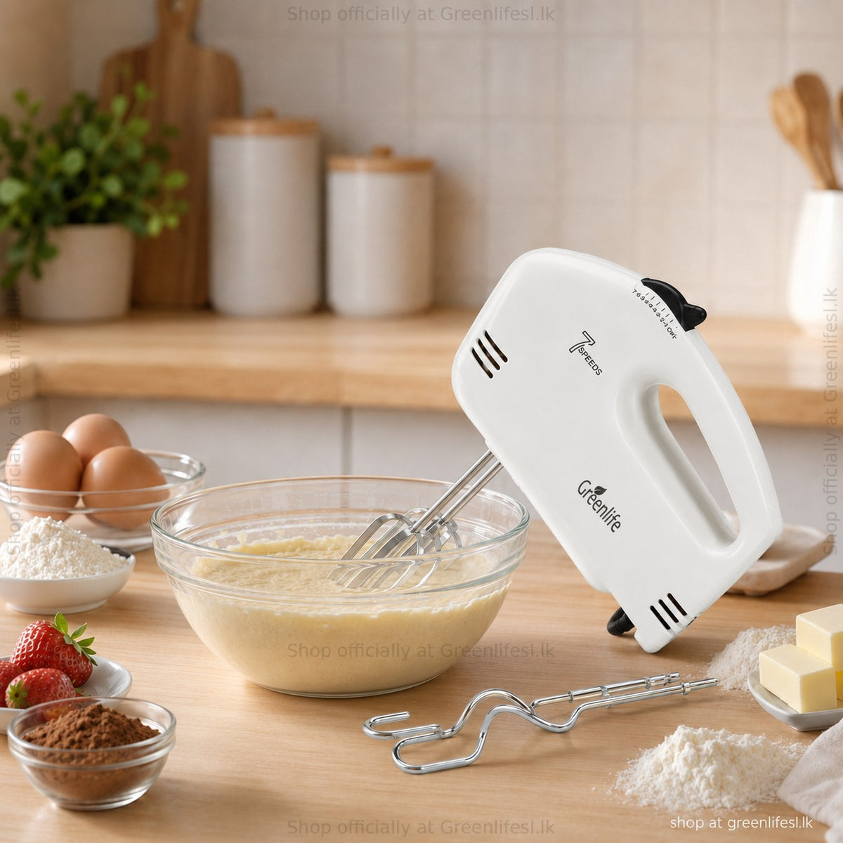 Greenlife 7-speed electric hand mixer 180W beside a bowl of cake batter and baking ingredients