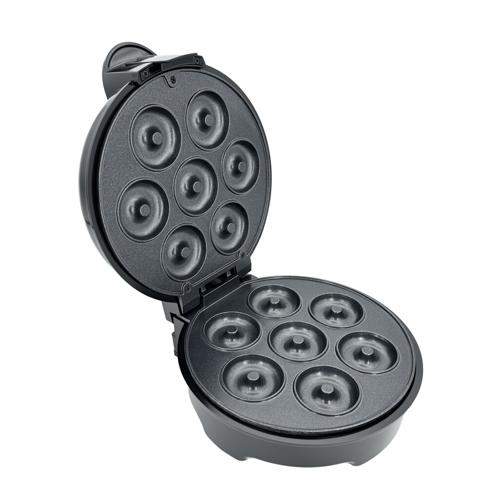 Open view of the 7-hole non-stick doughnut plate for even heat distribution.