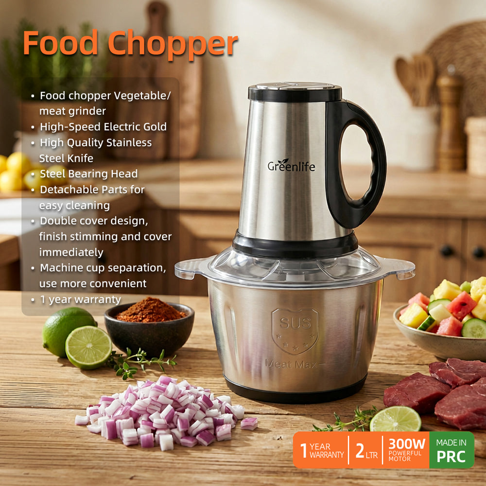 Greenlife electric food chopper in a kitchen with chopped onions, meat, and vegetables.