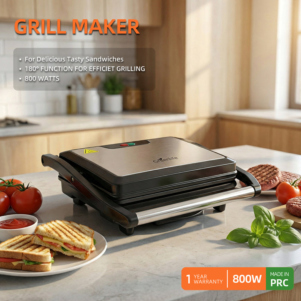 Greenlife 800W grill maker on a kitchen counter with toasted paninis and meat patties.