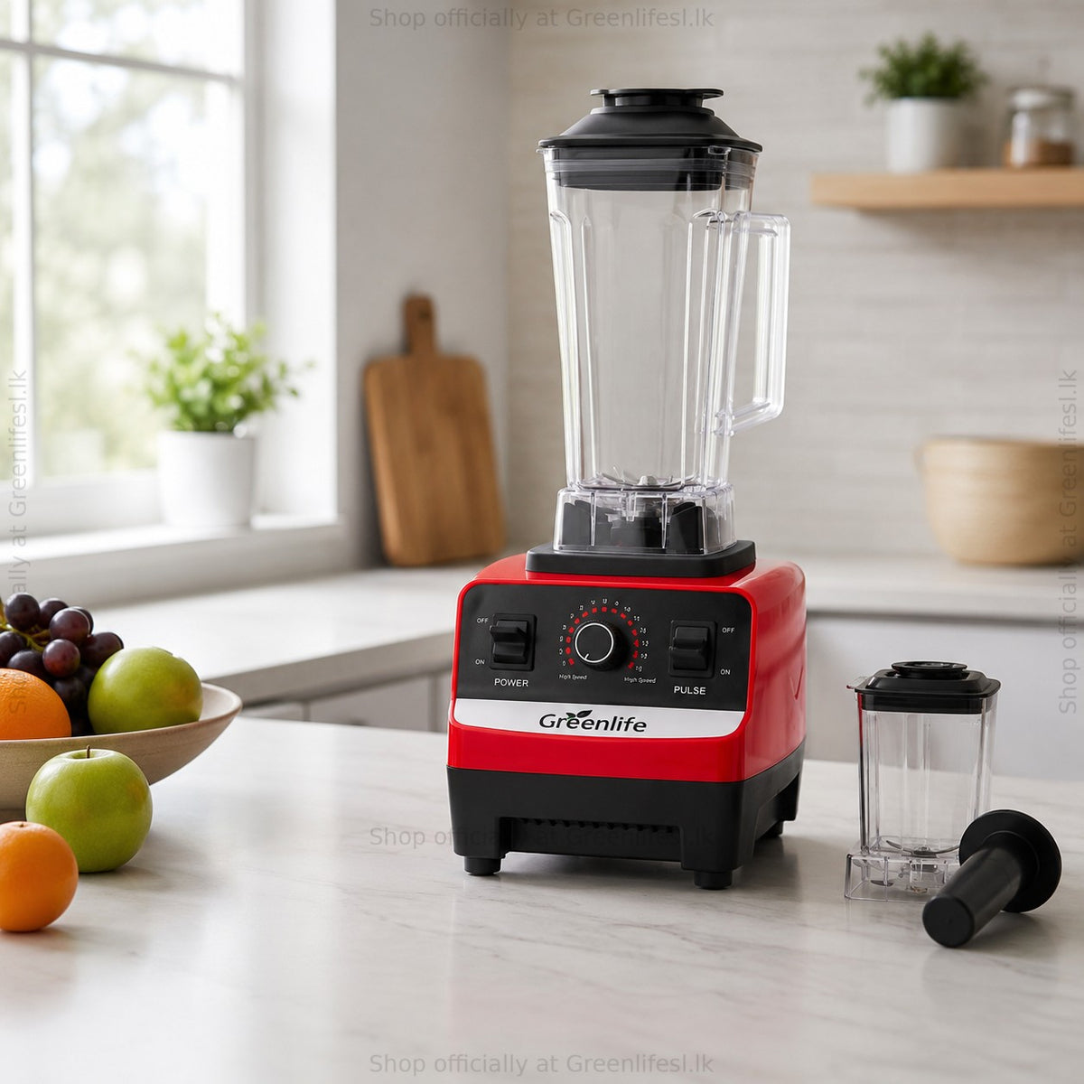 Green Life electric juicer blender 300W on a kitchen counter beside a fruit bowl
