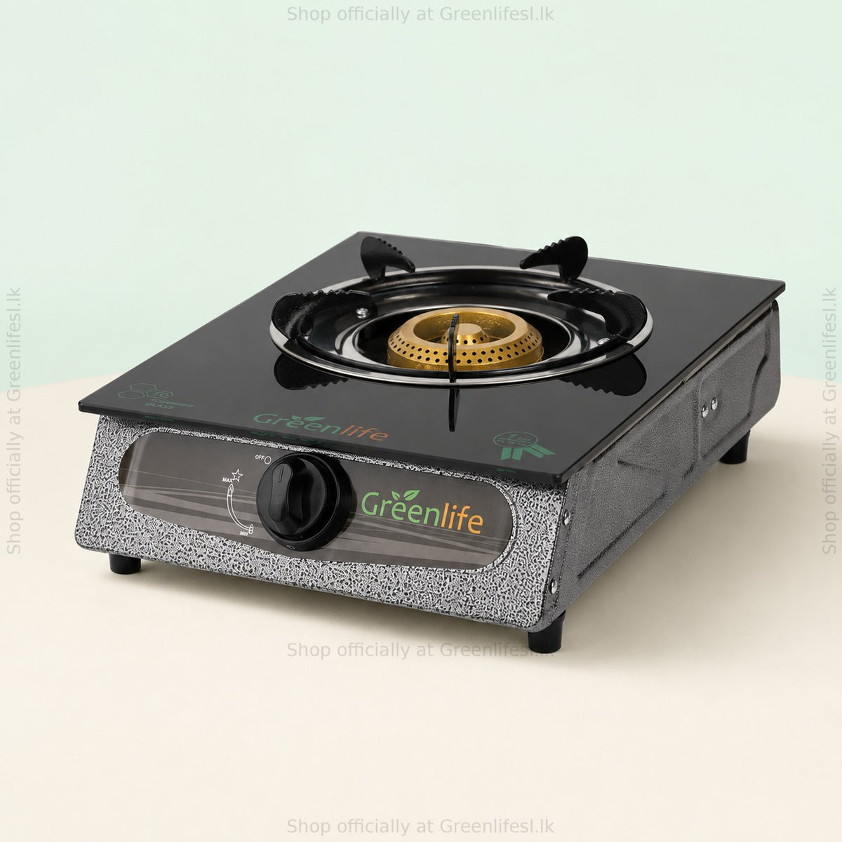 Green Life single burner glass top gas stove with brass burner, black pan support and speckled grey body