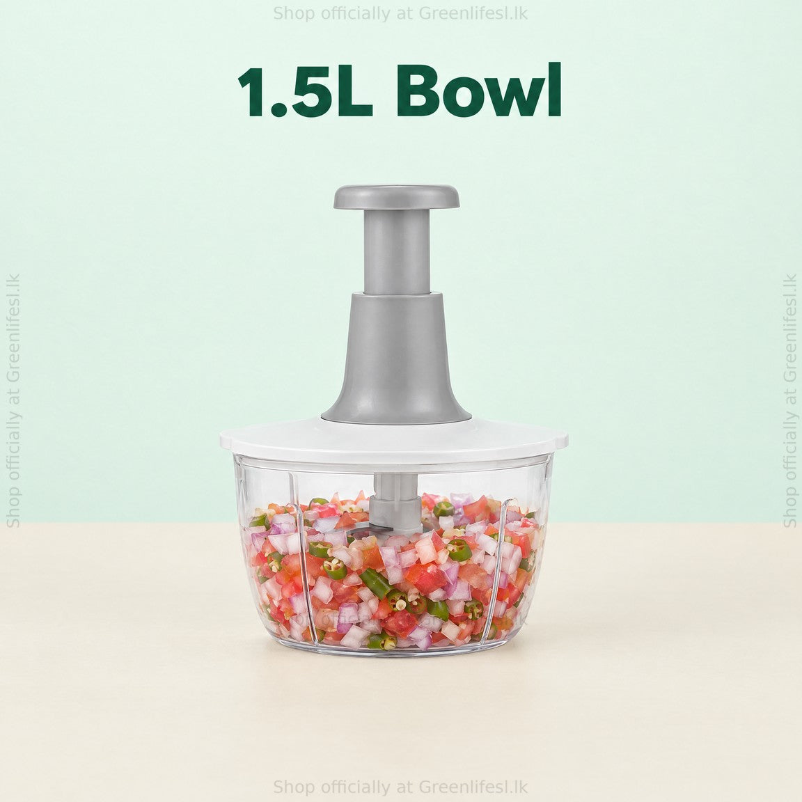Greenlife 1.5L manual food chopper, 1.5L bowl filled with chopped tomato and onion