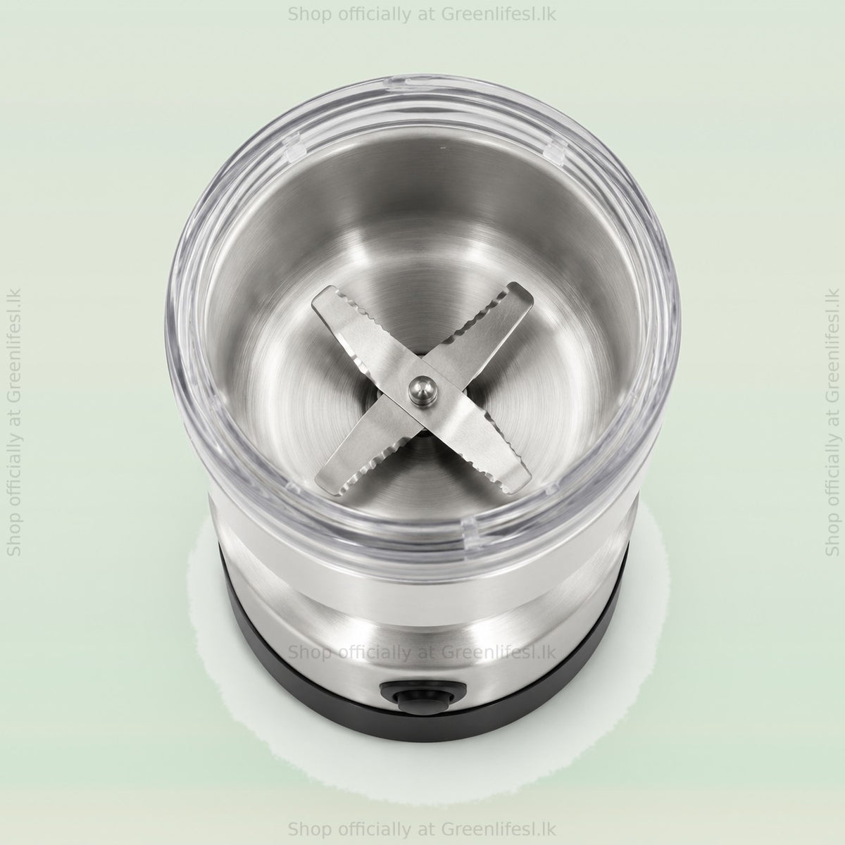 Top view into the Greenlife 2-in-1 coffee grinder and juice blender 300W showing the cross blade