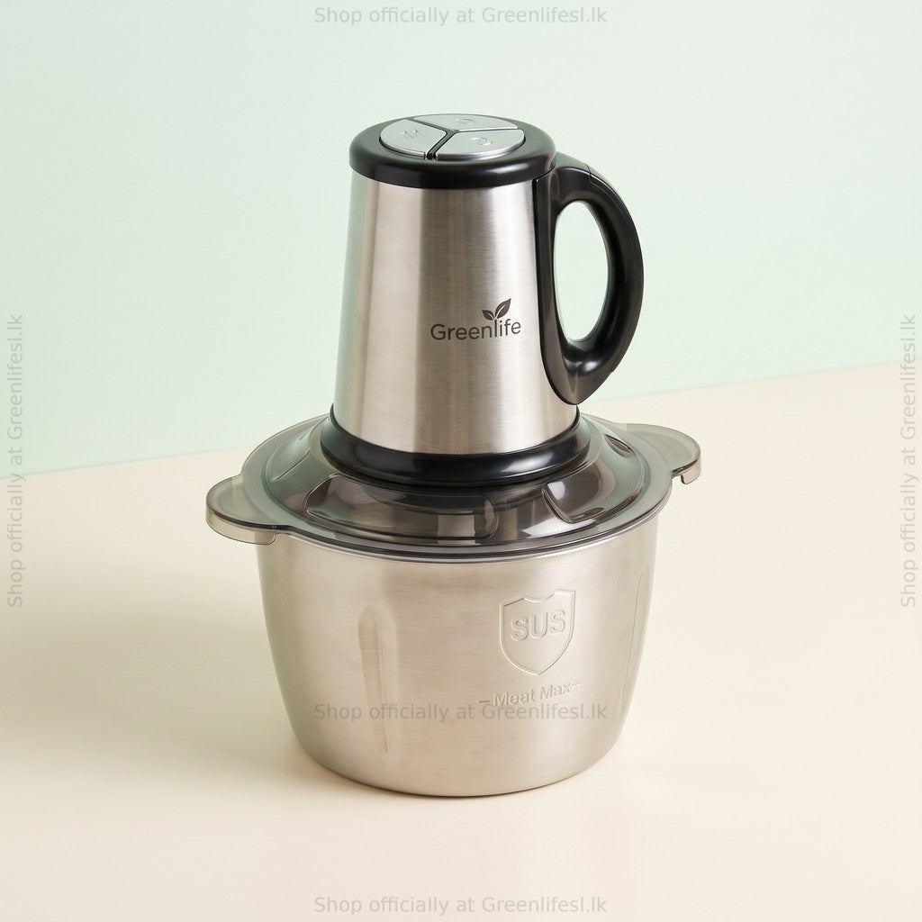 Greenlife 300W 3L electric food chopper from a low side angle with handle and clear lid